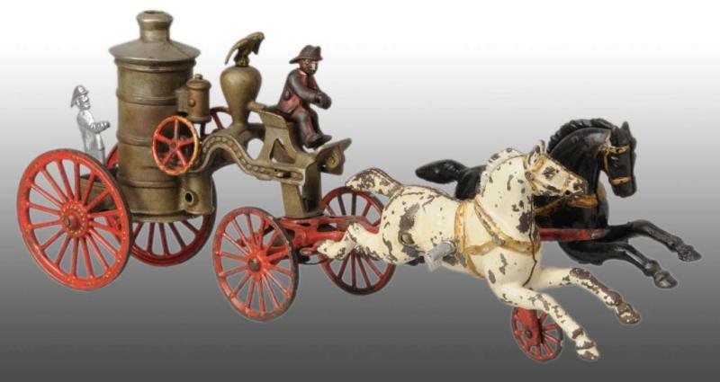 Appraisal: Cast Iron Horse-Drawn Fire Pumper Toy Description Includes original driver