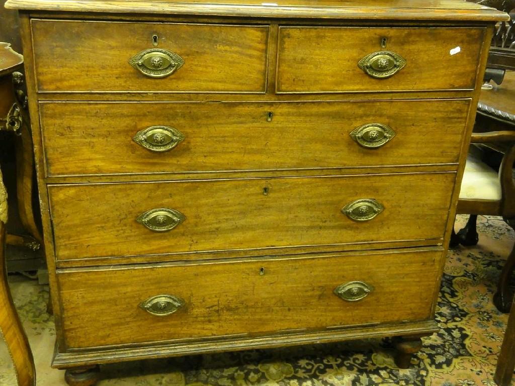 Appraisal: A th century mahogany chest fitted with three long and