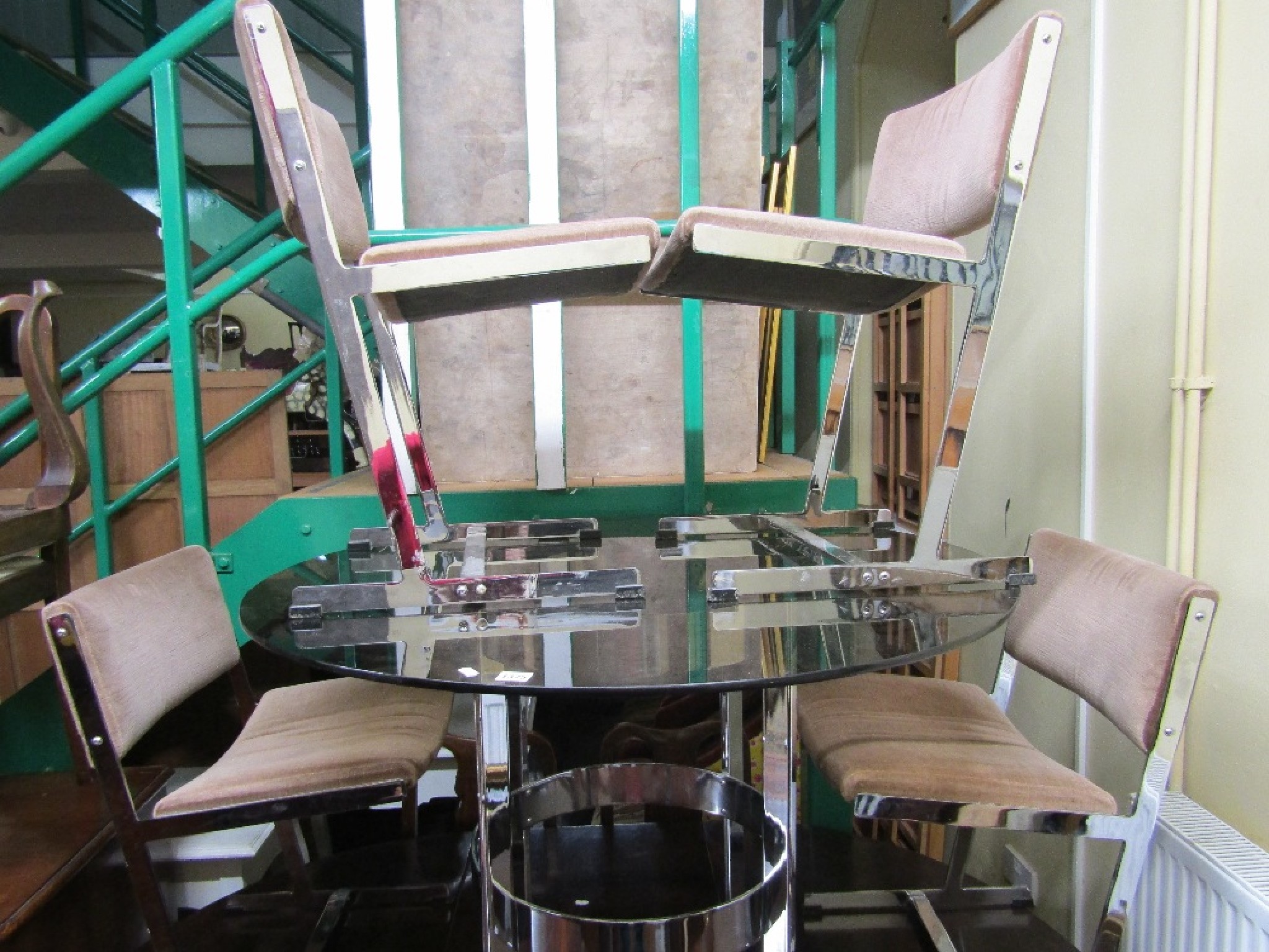 Appraisal: A good quality heavy chrome dining table by Merrow associates