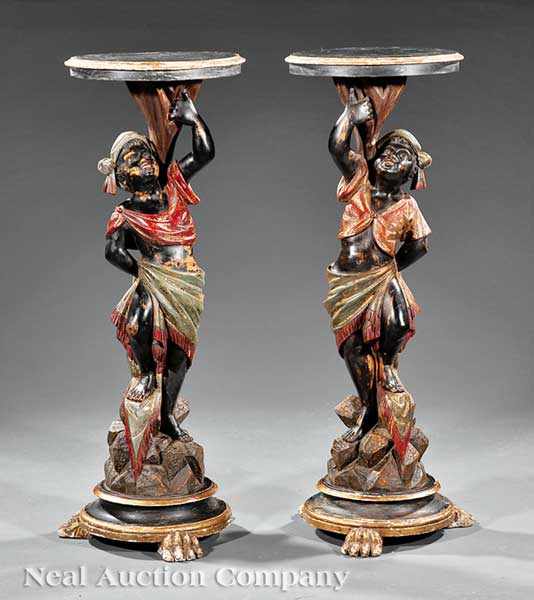 Appraisal: A Pair of Antique Carved and Polychromed Wood Blackamoor Pedestals