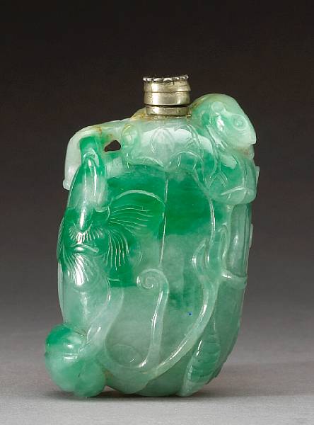 Appraisal: A mottled green jadeite melon form snuff bottle Well-hollowed and