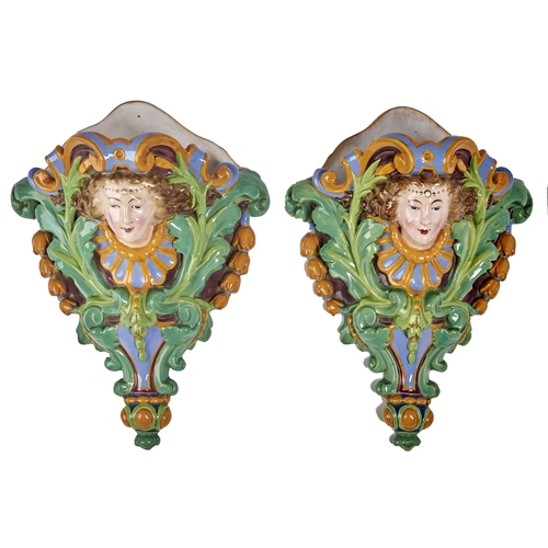 Appraisal: A pair of Victorian majolica wall pockets in the form