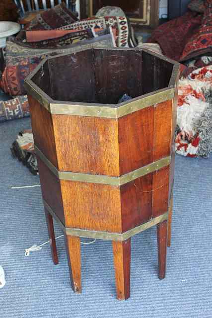 Appraisal: AN OCTAGONAL MAHOGANY AND OAK BRASS BOUND JARDINERE on tapering