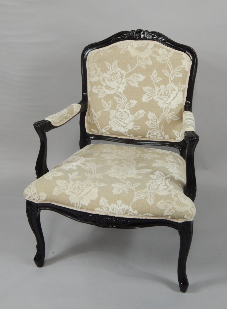 Appraisal: A Georgian style ebonised gloss armchair with overstuffed seat back