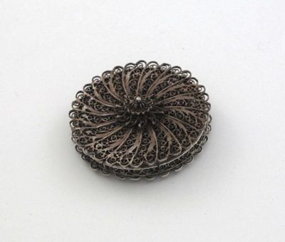 Appraisal: A late th early th century circular filigree smelling box