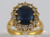 Appraisal: A yellow metal tests carat gold sapphire and diamond ring