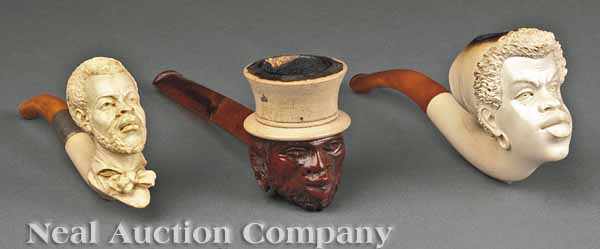 Appraisal: A Group of Three Black Caricature Meerschaum Pipes comprising one