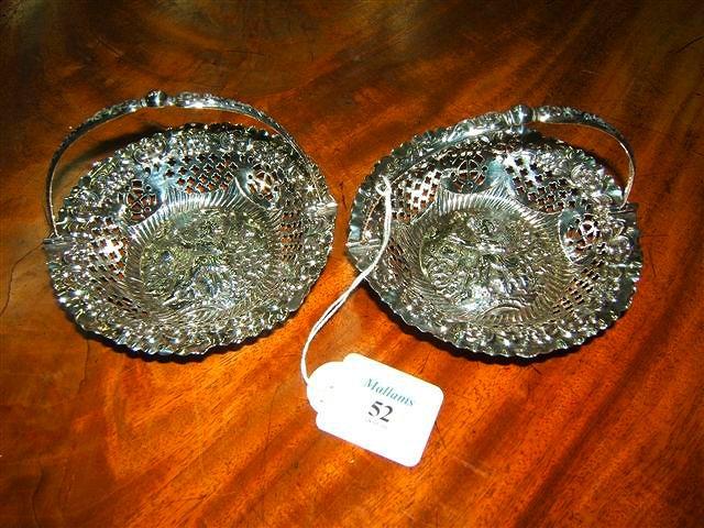 Appraisal: A pair of Edwardian silver bon bon baskets each with