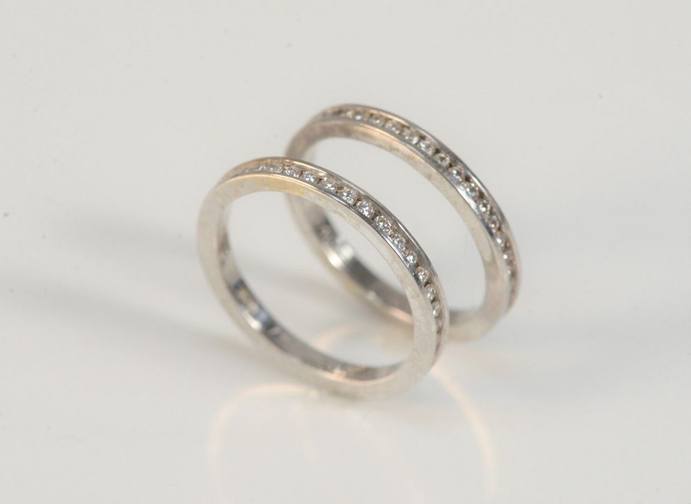 Appraisal: Two Hidalgo Karat White Gold Bands each with small channel