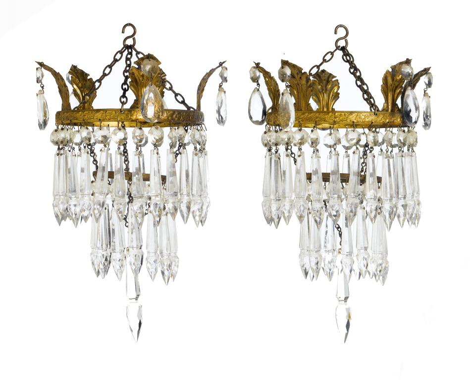 Appraisal: A PAIR OF GILT BRASS CORRIDOR CHANDELIERS hung with two