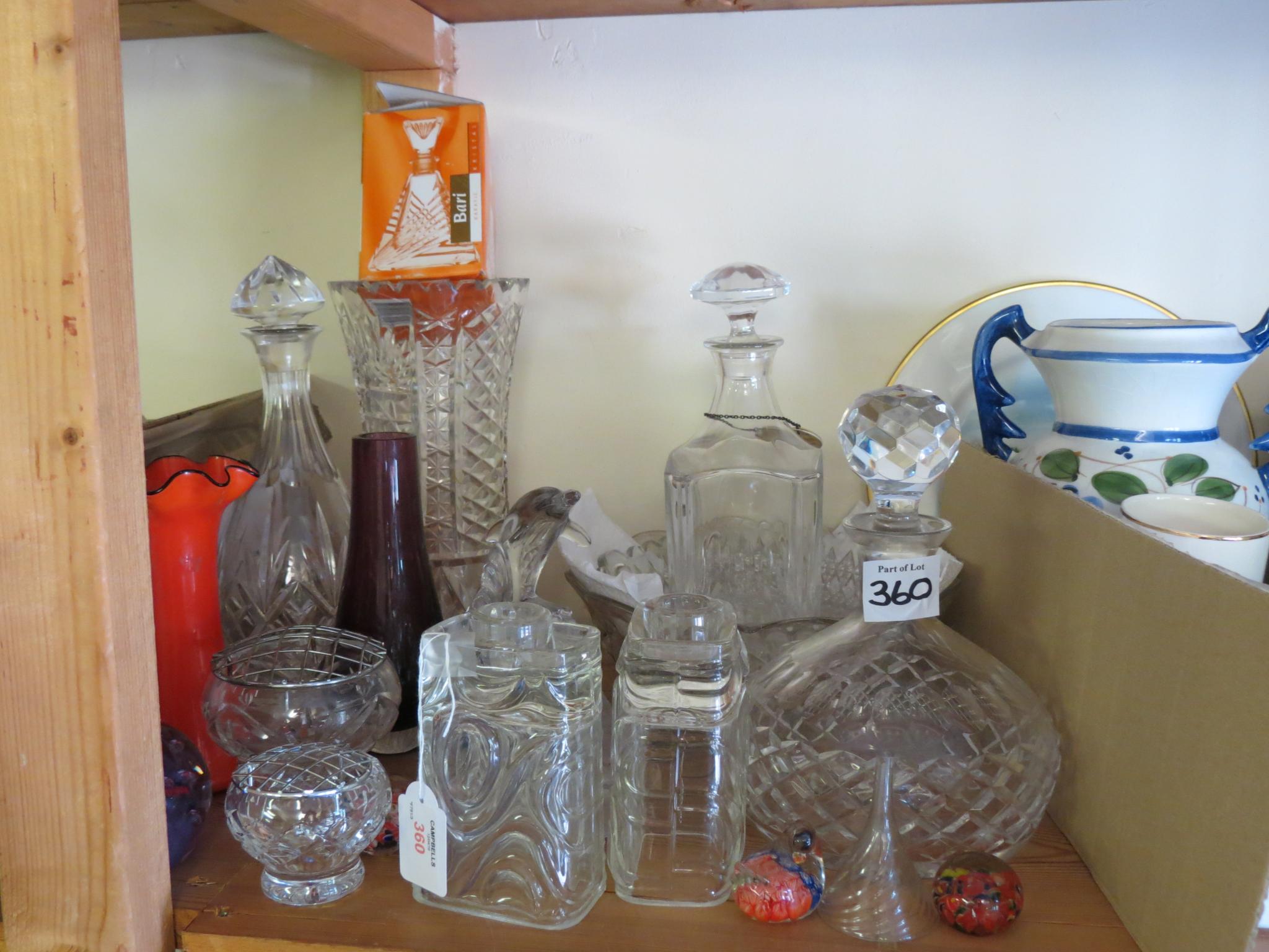 Appraisal: A pair of clear glass candlesticks possibly Whitefriars rectangular moulded