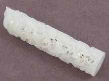 Appraisal: A Chinese white jade cylinder intricately pierced and carved cm