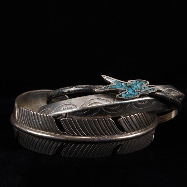 Appraisal: Three Native American Sterling Silver cuff bracelets including a feather