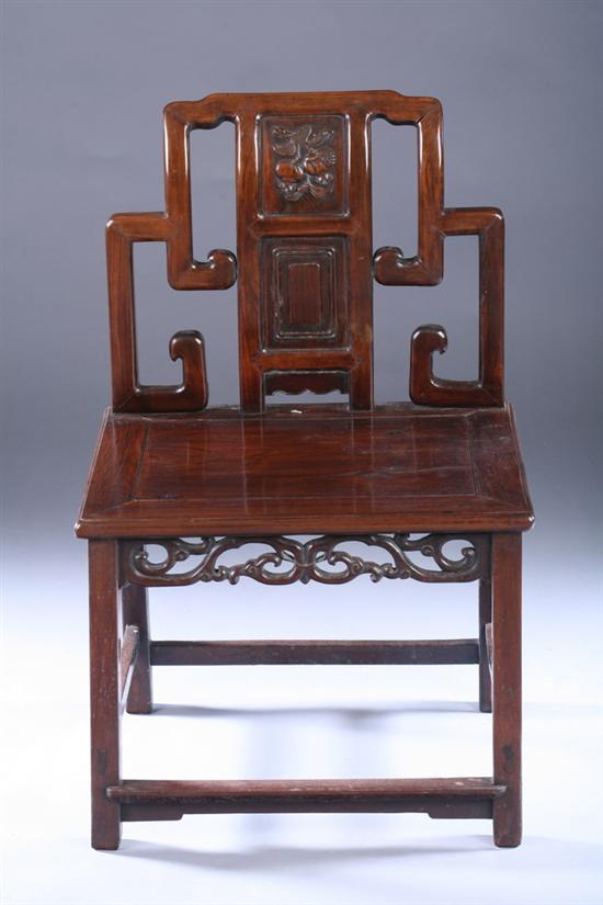 Appraisal: CHINESE CARVED ROSEWOOD CHAIR th century Back carved to depict