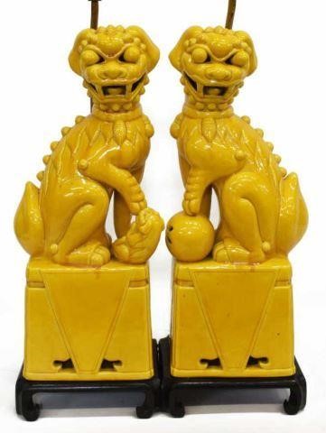 Appraisal: pair Chinese ceramic figures depicting seated foo lions now fashioned