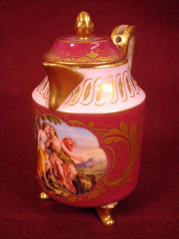 Appraisal: A Vienna porcelain small coffee pot and lid painted with