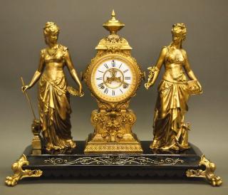 Appraisal: Ansonia Statue clock A late th century figural mantel clock