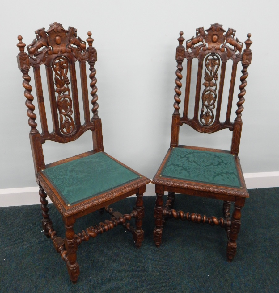 Appraisal: A pair of Victorian carved oak side chairs each with