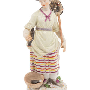 Appraisal: A Meissen Porcelain Figure of a Fisherwoman Circa bearing crossed