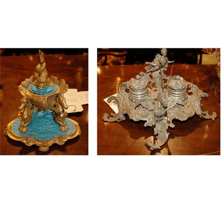 Appraisal: Two Rococo Style Patinated-Metal Inkwells Estimate -