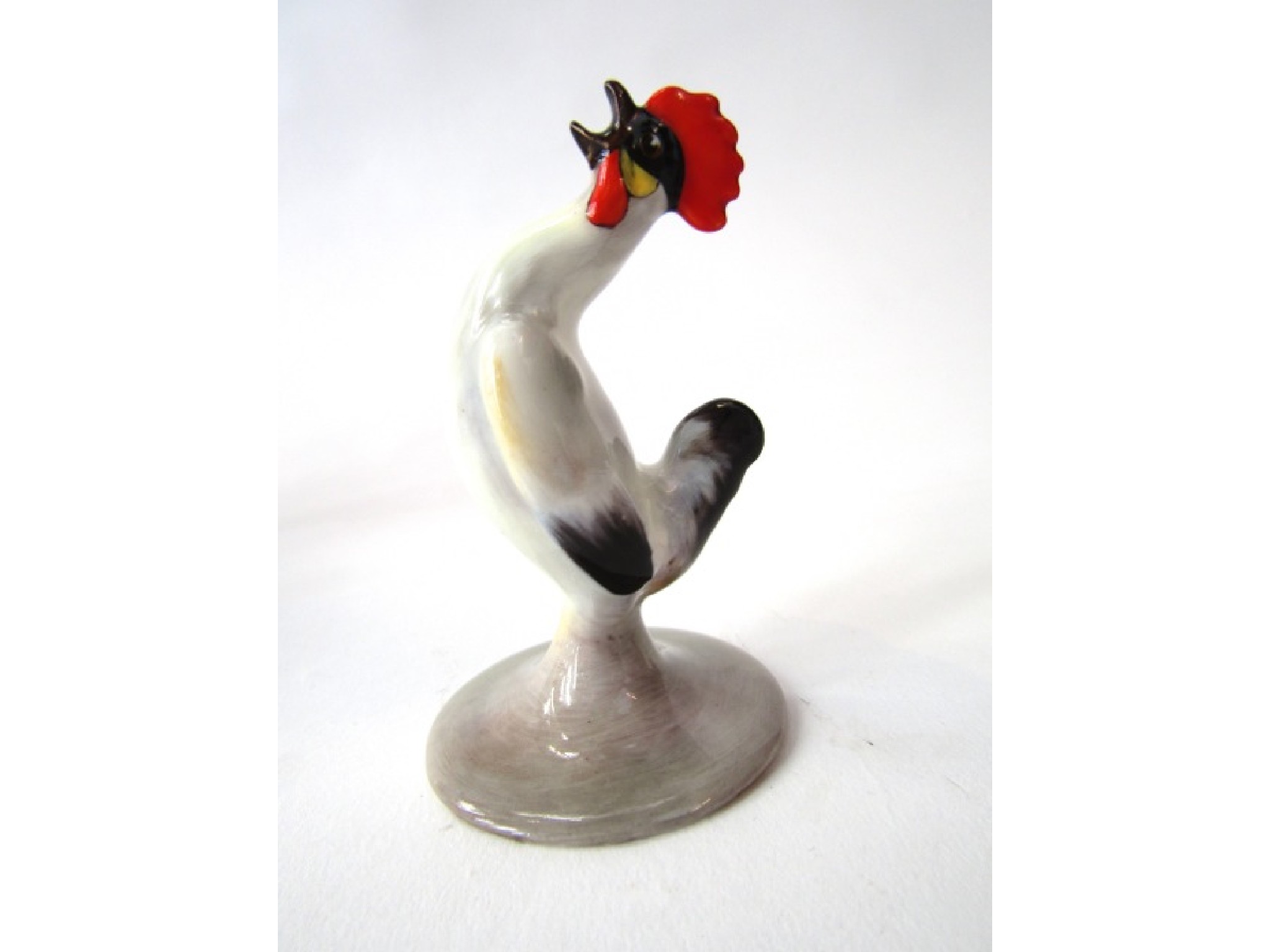 Appraisal: An unusual Royal Doulton model of a crowing cockerel in