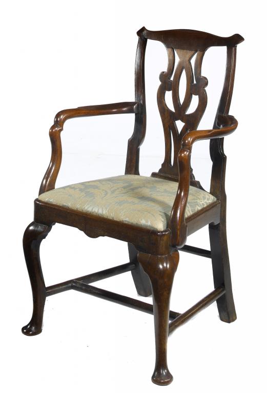 Appraisal: A GEORGE III FRUITWOOD ELBOW CHAIR with scratch moulded stiles