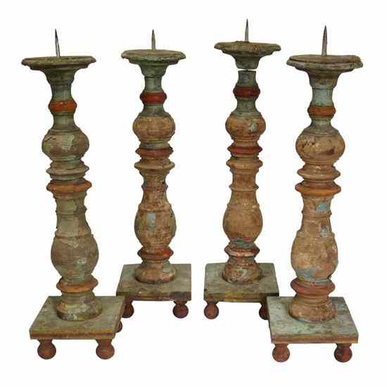 Appraisal: A Set of Indo-Portuguese Painted Teak Pricket Candlesticks circa each