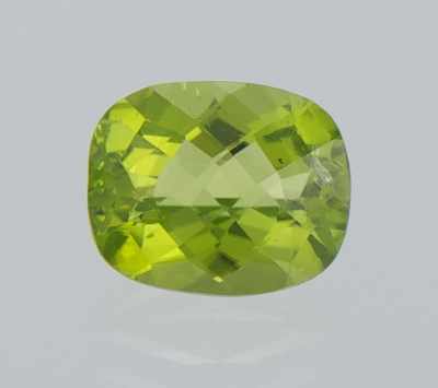 Appraisal: An Unmounted Peridot Weighing ct checkered cushion cut Medium yellowish