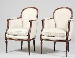 Appraisal: PAIR OF LOUIS XVI STYLE MAHOGANY BERGERES Each with beige