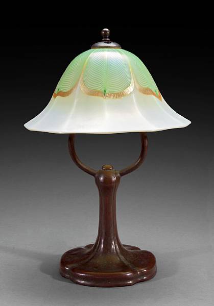 Appraisal: A Handel patinated metal and American decorated glass lamp early