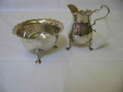 Appraisal: A LATE VICTORIAN CREAM JUG AND SUGAR BOWL the jug