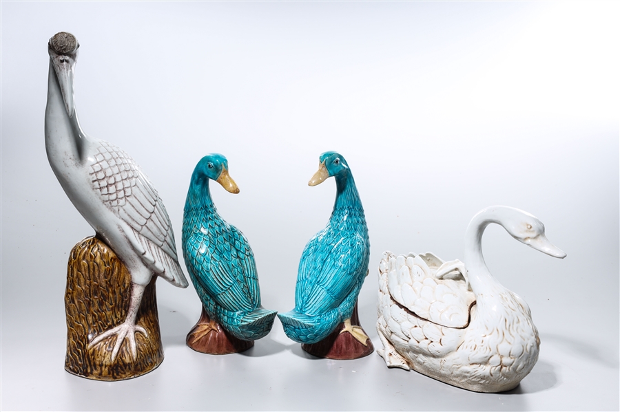 Appraisal: Group of four Chinese glazed porcelain birds including two blue