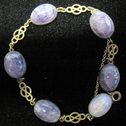 Appraisal: Amethyst scarab flexible bracelets et with five Oval scarabs