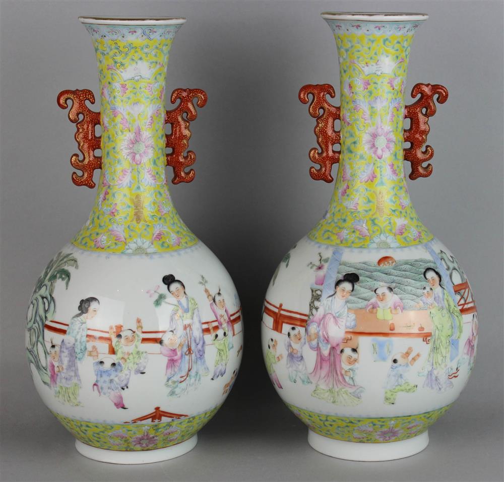 Appraisal: A PAIR OF CHINESE FAMILLE ROSE VASES iron red Qianlong