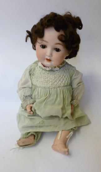 Appraisal: A Porzellanfabrik Mergersgereuth bisque head baby doll with brown glass