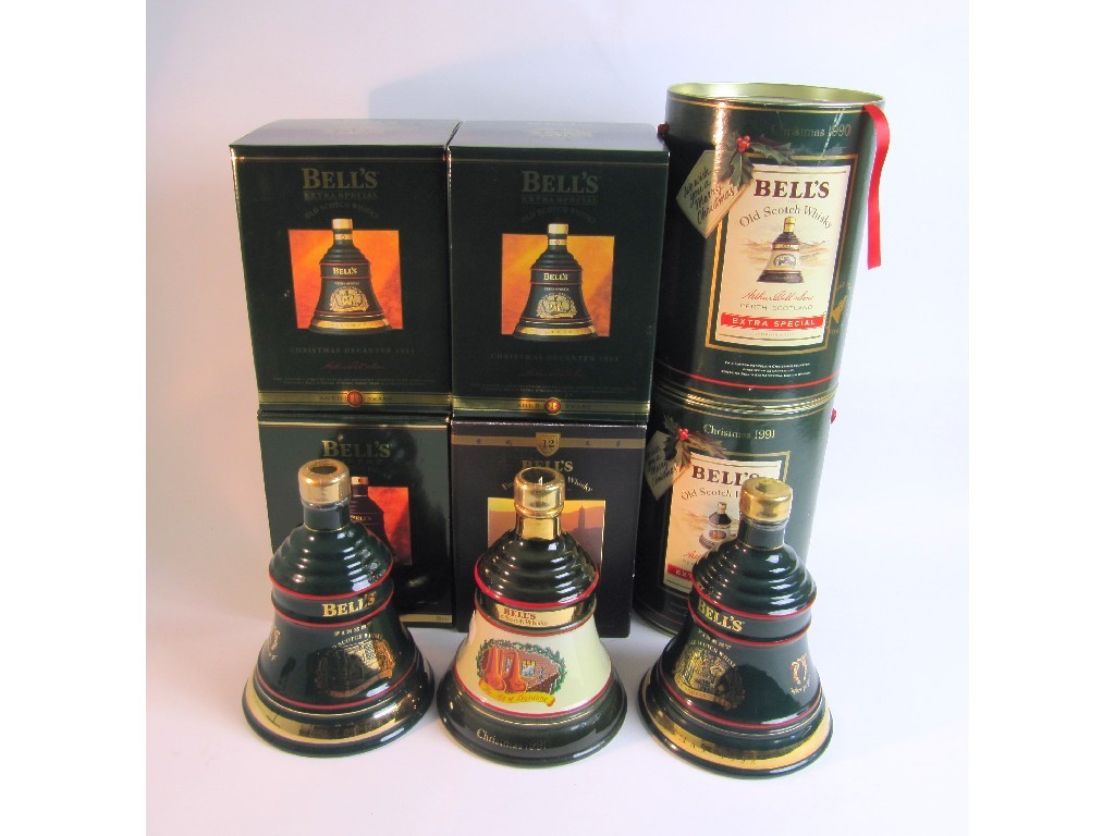 Appraisal: Three Wade Bells whisky Christmas decanters two from boxed Wade