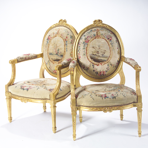 Appraisal: Louis XVI style open arm chairs upholstered in th c