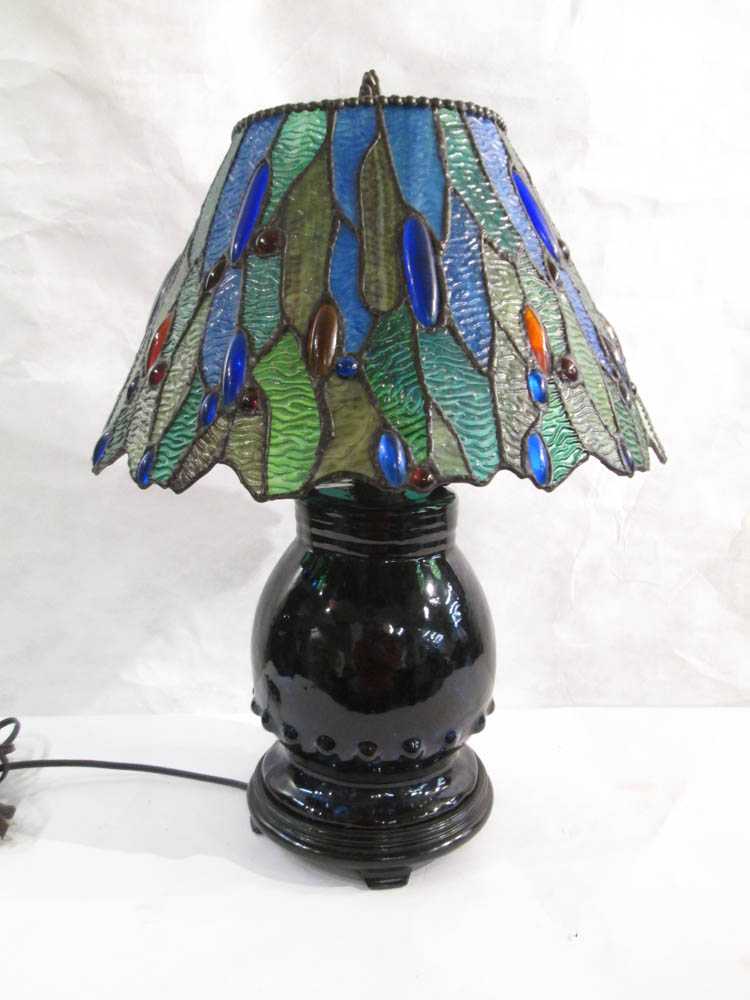 Appraisal: STAINED LEADED GLASS TABLE LAMP blue pottery based having a