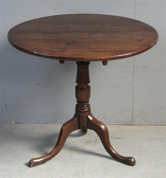 Appraisal: George III Oak tilt top wine table on turned column