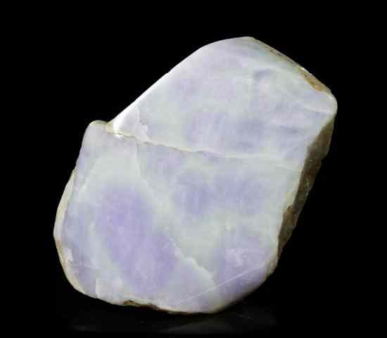 Appraisal: A Lavender Jade Boulder of naturalistic form with one side