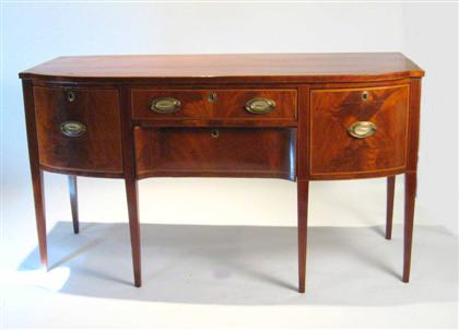 Appraisal: George III satinwood banded mahogany sideboard The D-shaped rectangular top