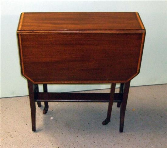 Appraisal: Early twentieth century mahogany and crossbanded Sutherland table on twin