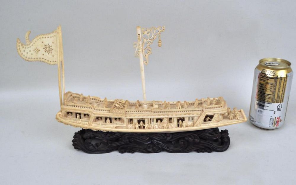 Appraisal: Carved Chinese Pleasure Boat Stand with wooden stand having naturalistic