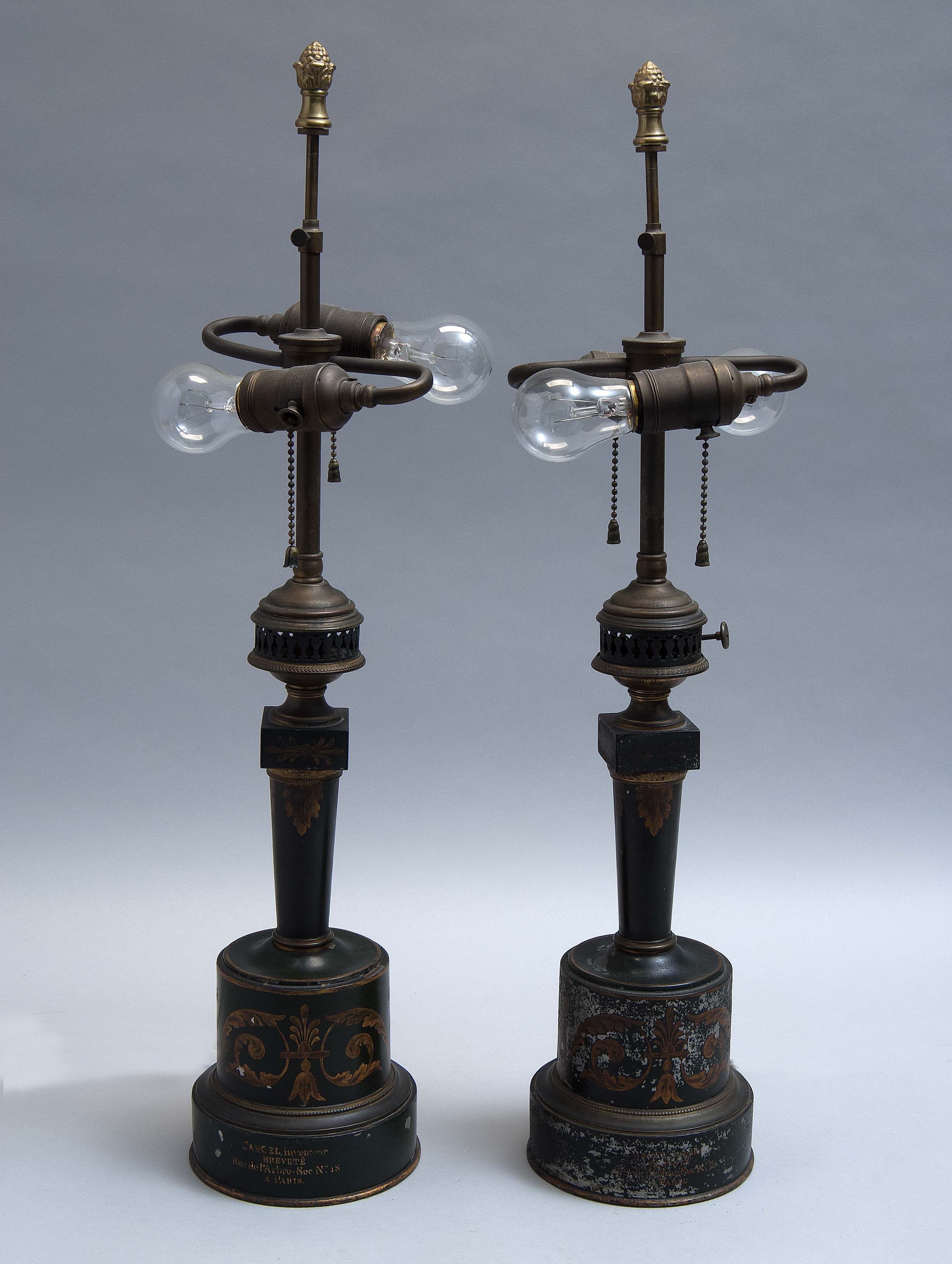 Appraisal: PAIR OF FRENCH TOLE CANDLESTICKS CONVERTED INTO TABLE LAMPS th