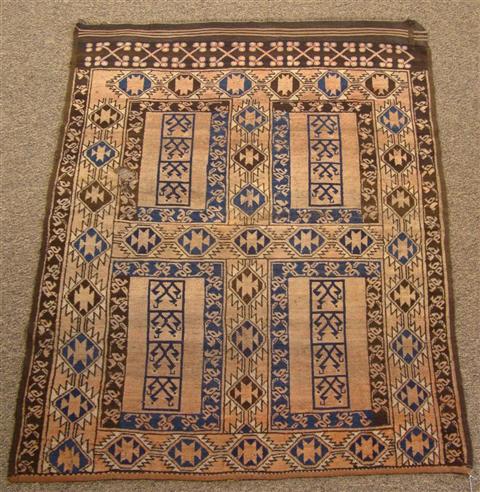 Appraisal: TURKOMAN AFGHAN RUG the design having faded red blue brown