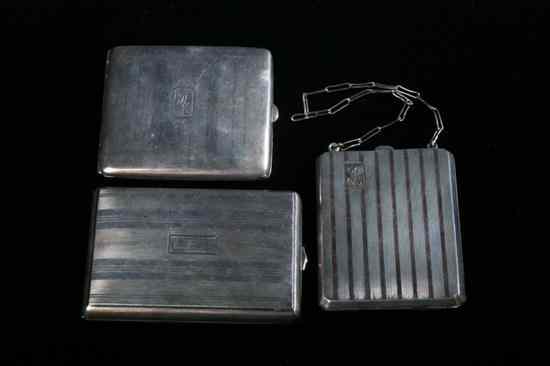 Appraisal: TWO STERLING SILVER CIGARETTE CASES AND A COIN CASE One