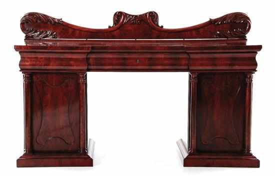 Appraisal: American late Classical carved mahogany pedestal sideboard circa acanthus-carved shaped