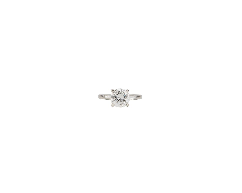 Appraisal: Platinum and Diamond Ring Platinum and Diamond Ring centering a