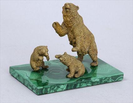 Appraisal: CONTINENTAL GILT BRONZE BEAR GROUP ON MALACHITE BASE Modeled as