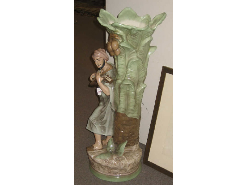 Appraisal: ROYAL DUX UMBRELLA STAND Depicting bearded and robed Orientalist male